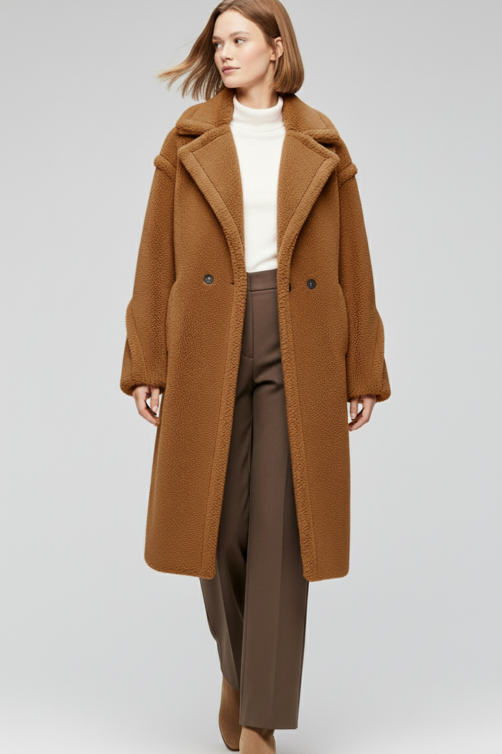Woman wearing a brown coat on a white background