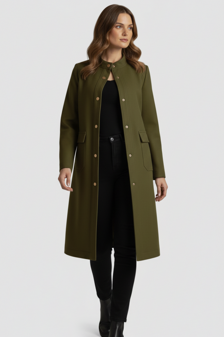 Woman wearing a green coat on a white background