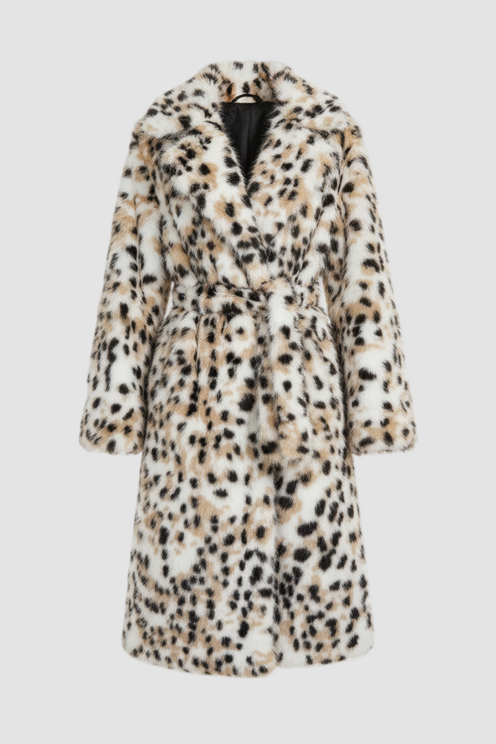 Woman wearing the LYSERRA Leopard Shearling Coat walking outdoors in a winter city setting