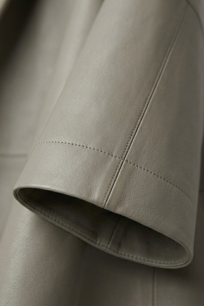 ZOE - Close-up of grey leather sleeve detail
