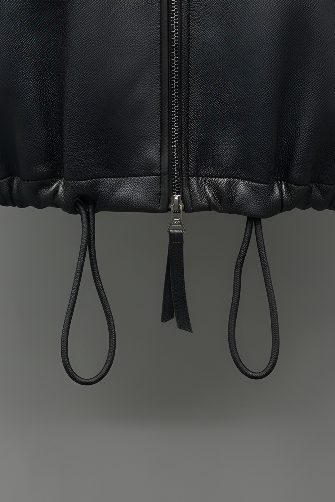 Bubble leather jacket hem drawstring detail on black cropped leather jacket for women