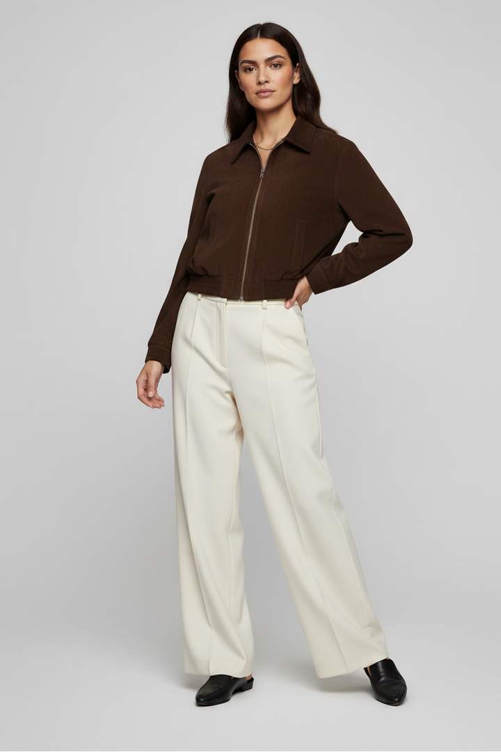 BRADLEY - Close-up of suede texture on brown bomber jacket