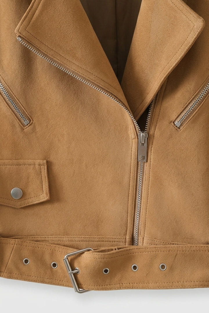 Close-up of a brown leather jacket with a zipper on a white background
