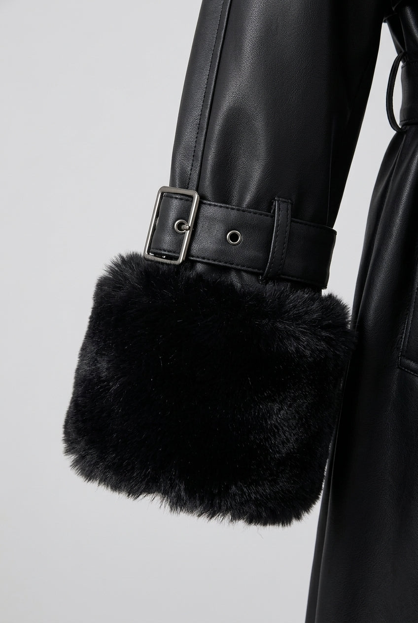 Close-up of the faux fur cuff with the buckled cuff strap just above it on the DELANEY fur trim faux leather trench coat