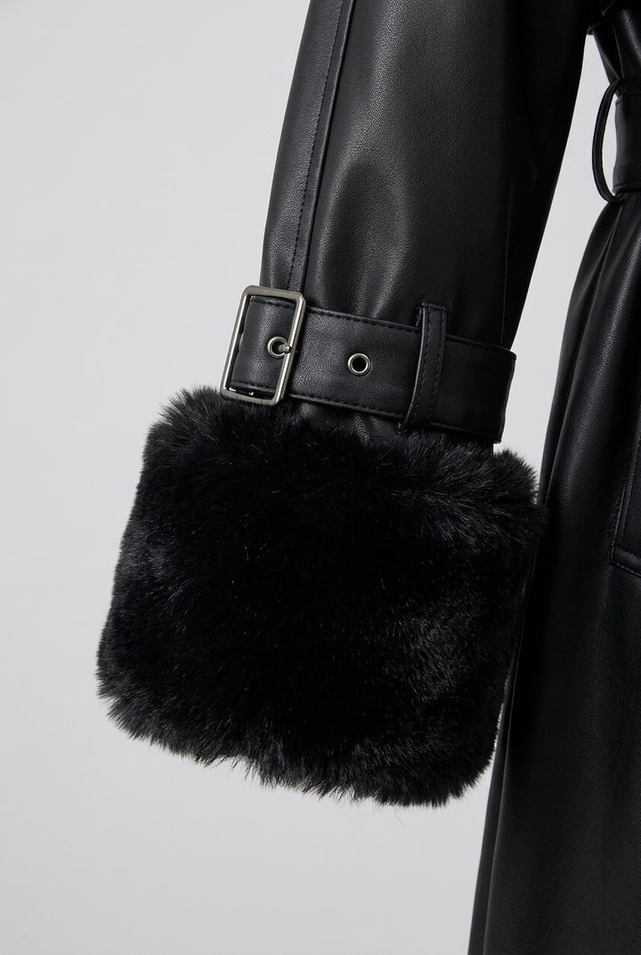 Close-up of the faux fur cuff with the buckled cuff strap just above it on the DELANEY fur trim faux leather trench coat
