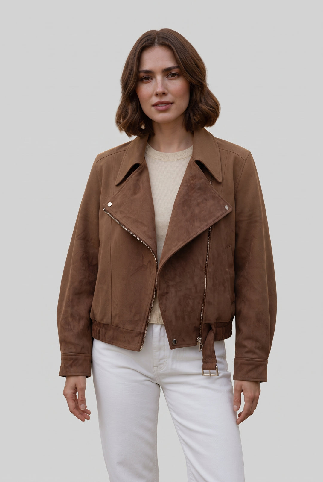 Woman wearing the FLORA oversized suede biker jacket in brown, front view