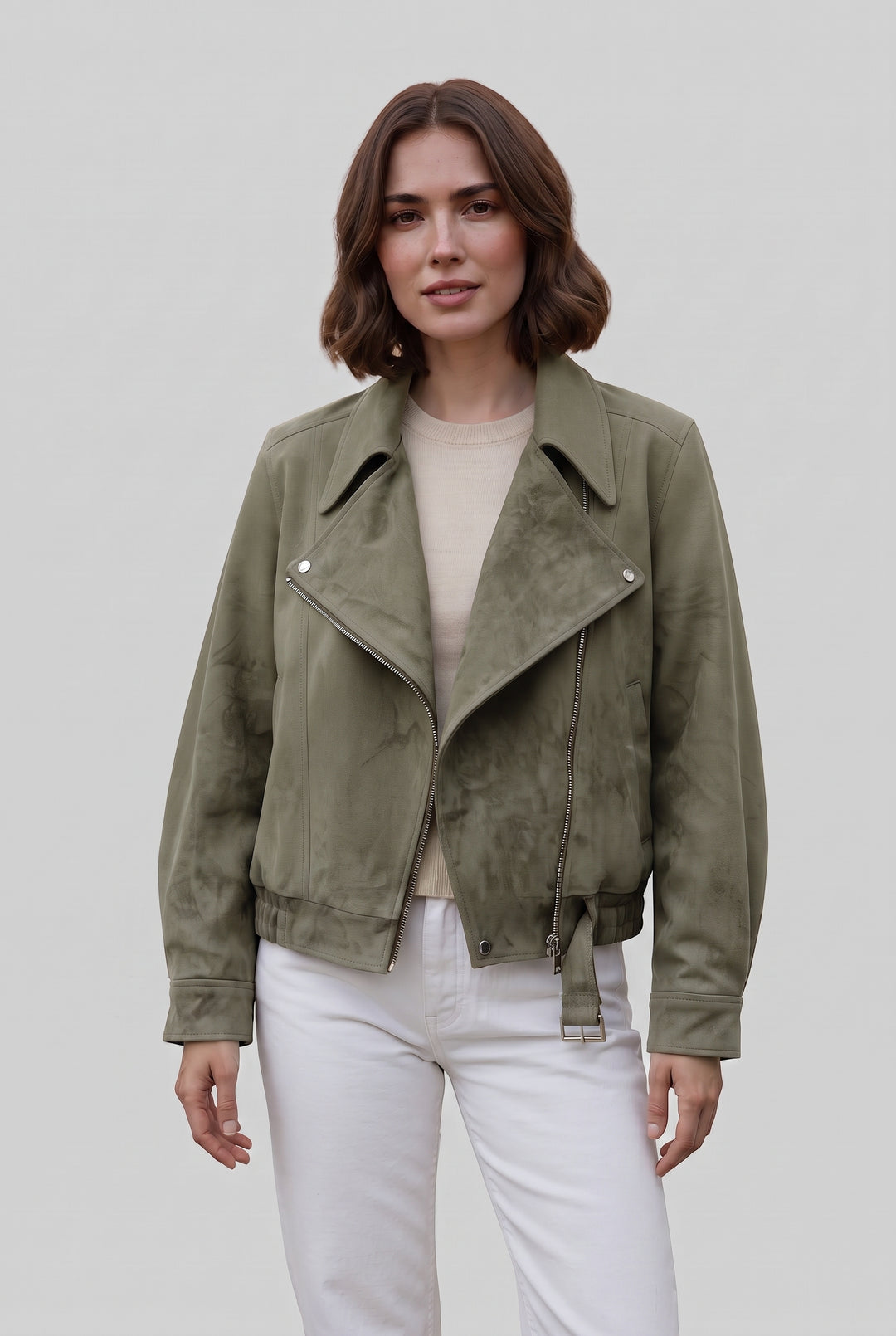 Woman wearing the FLORA oversized suede biker jacket in green, front view
