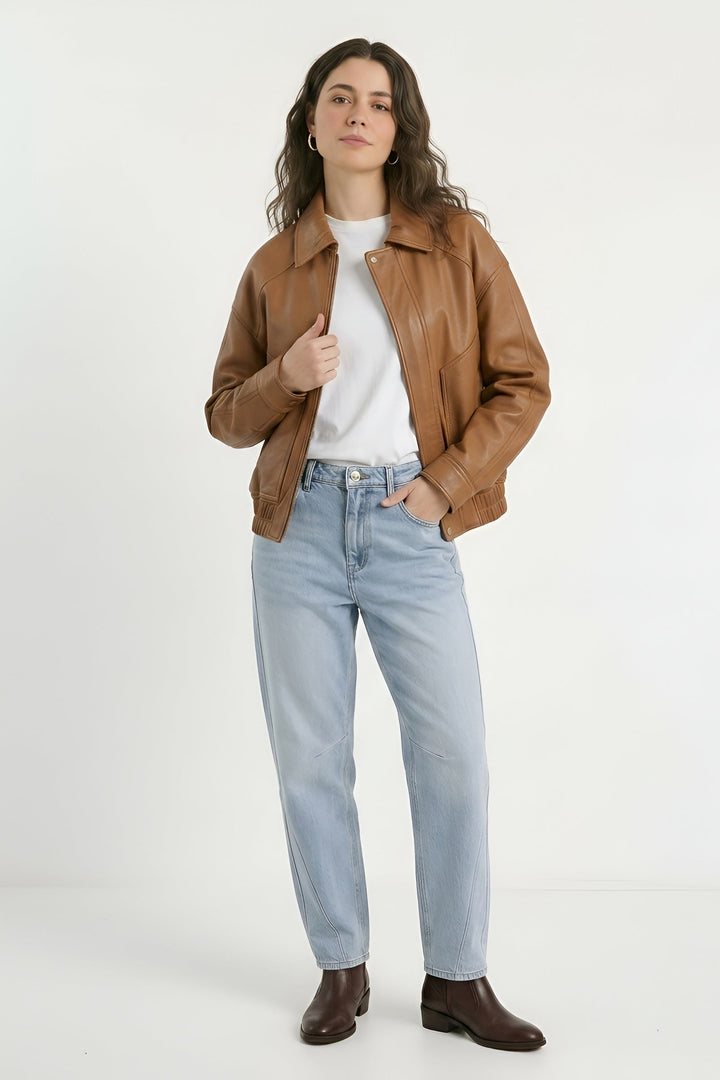 RYLEE - Brown leather jacket, model touching collar