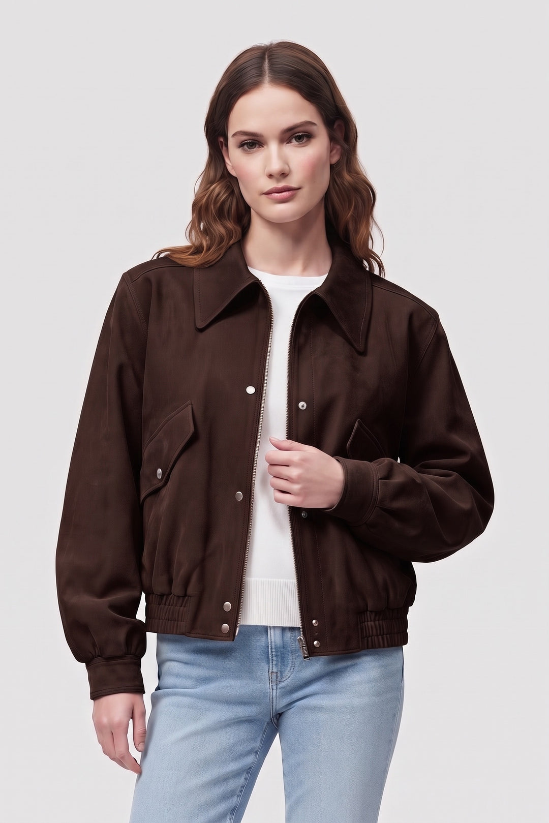 Woman wearing the ODETTE oversized faux suede bomber jacket in brown, front view