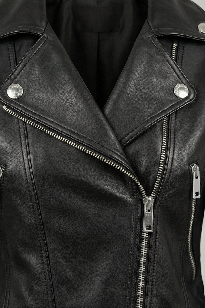 Ryder - Black leather motorcycle jacket, close-up of zipper detail